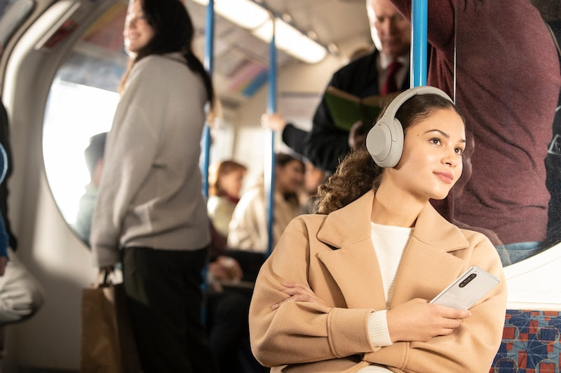 WH-1000XM4 headphones travelling on a bus